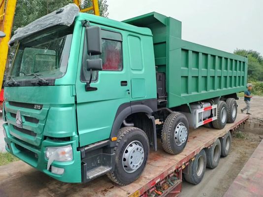 12 banden Sinotruk HOWO 8*4 dumptruck tweedehands vrachtwagen groen met handgeschakelde transmissie